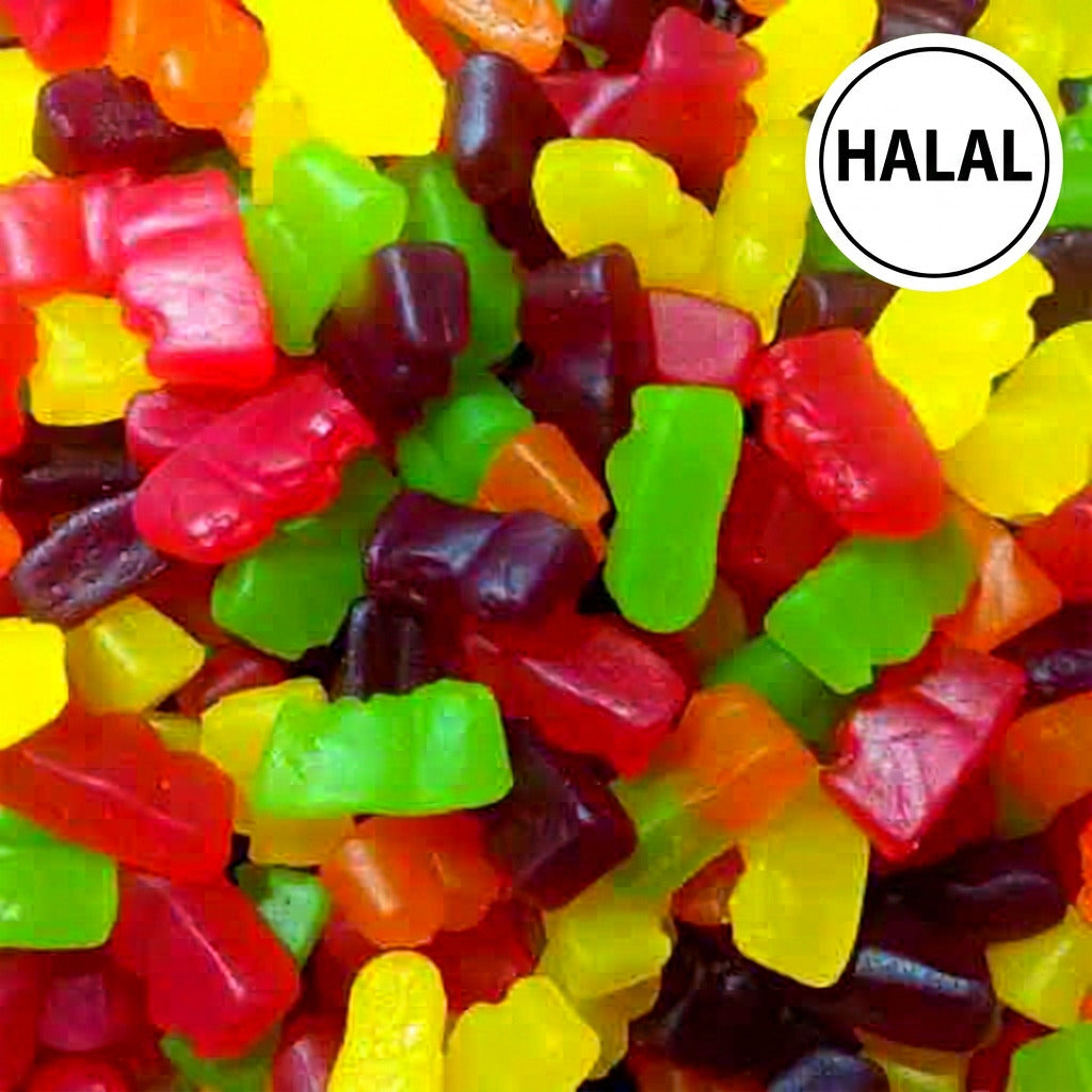 A close-up image of colorful Jelly Babies gummy candies, showing various colors and shapes of the candies.